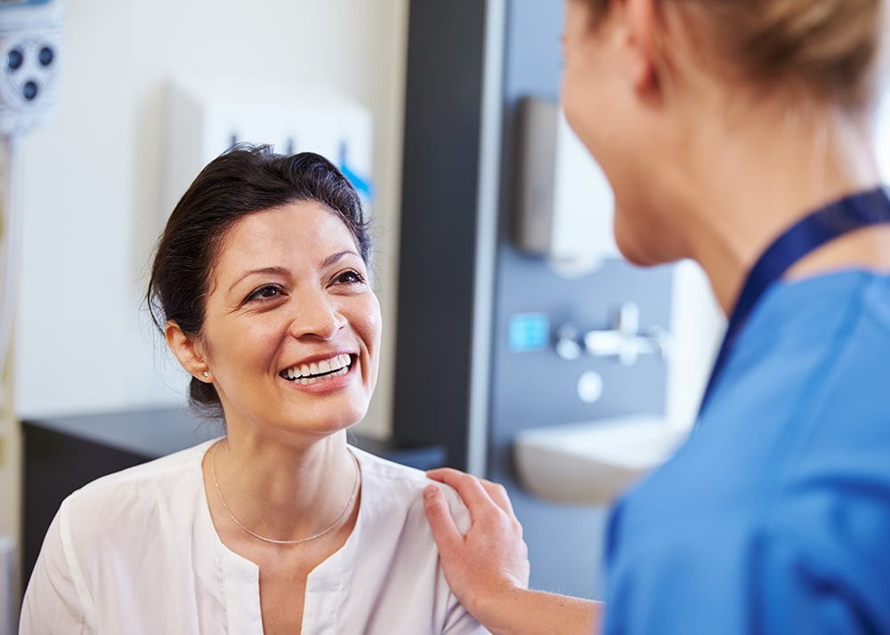 Patient Speaking With Doctor